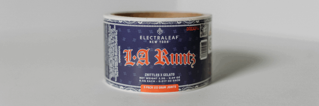 Navy blue laminated label with orange writing that shows Electraleaf new york L.A. Runtz joints 