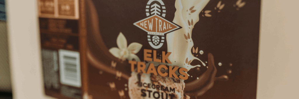 Brown New Trail Metallic Label that is for beer that is Elk Tracks Ice Cream Stout